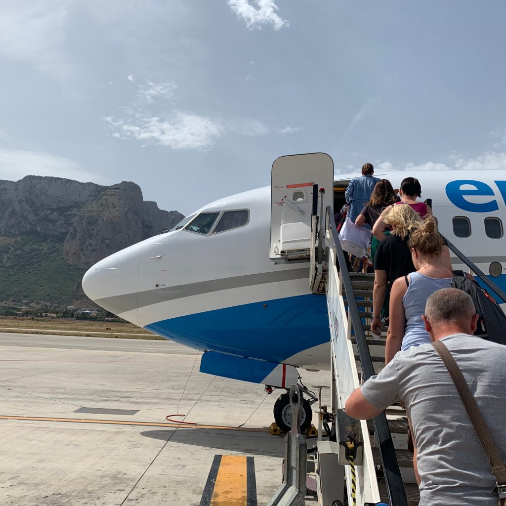 people are getting on the plane