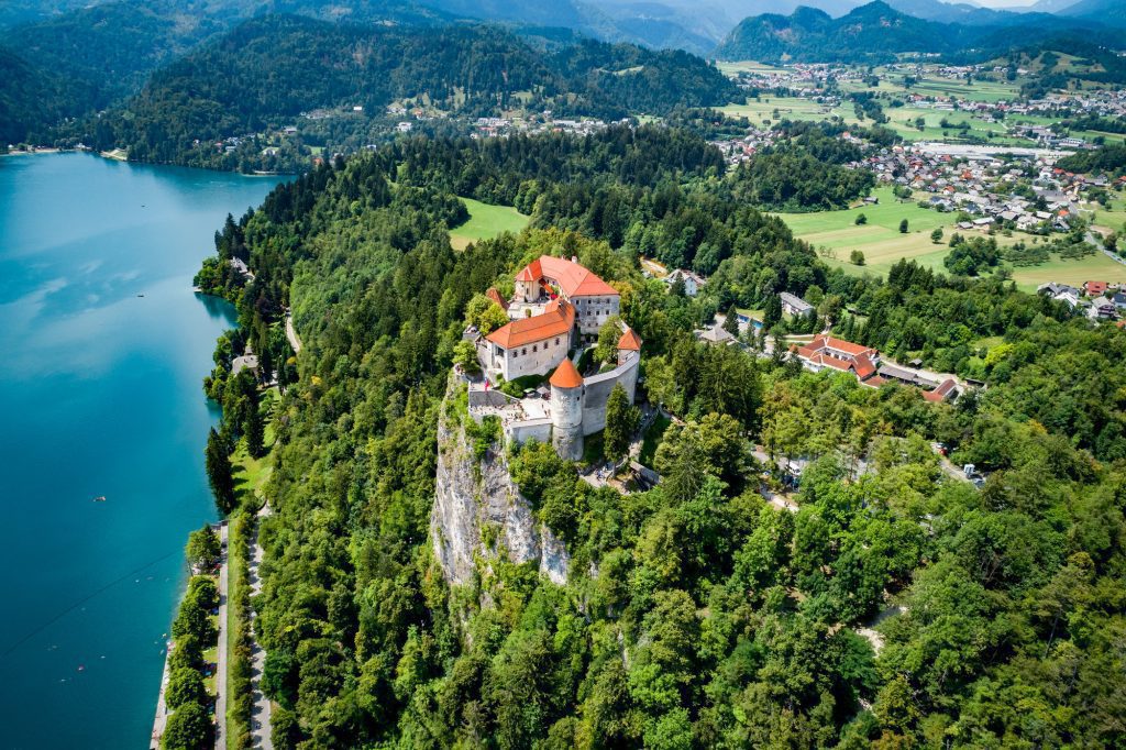 Bled Castle overlooking Lake Bled at sunset – one of the top things to do in Bled
