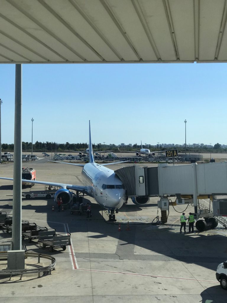 Passenger airplane landing at Ljubljana Airport, starting point for transfers to Lake Bled