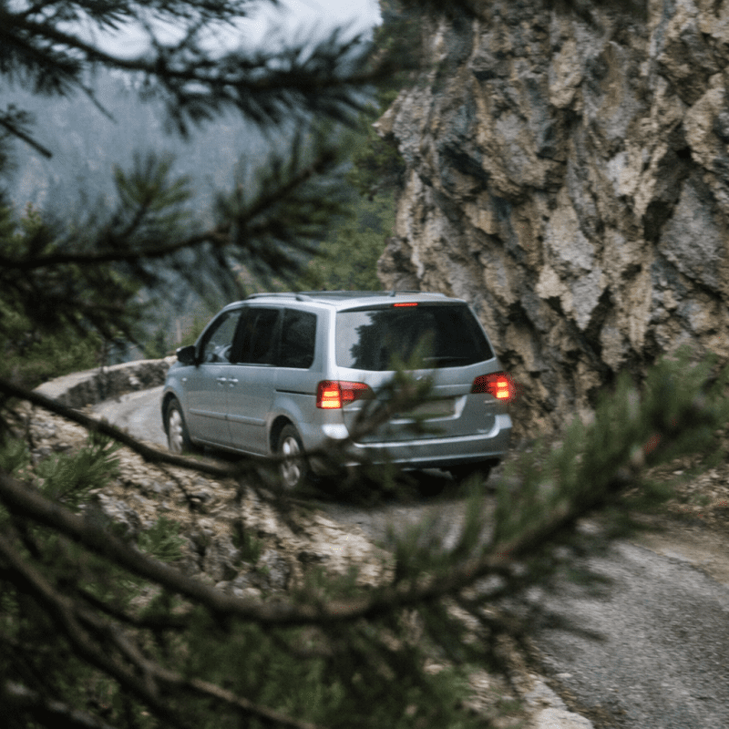 Loibl Pass descent towards Lake Bled — view of Julian Alps (2026)